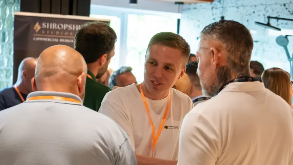 Owen O'Callaghan talking with trades at a T.I.P.S. networking event